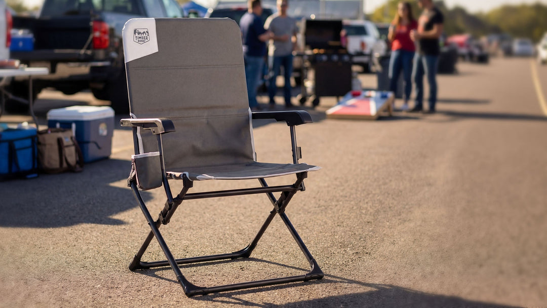 Early-season football tailgate with comfortable chairs, a cooler, and organized game day gear